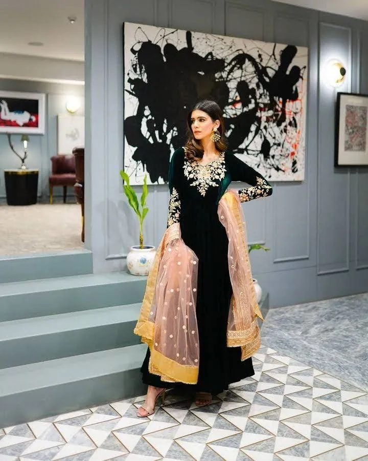 Dark Green Anarkali Gown in Velvet with Embroidery Work