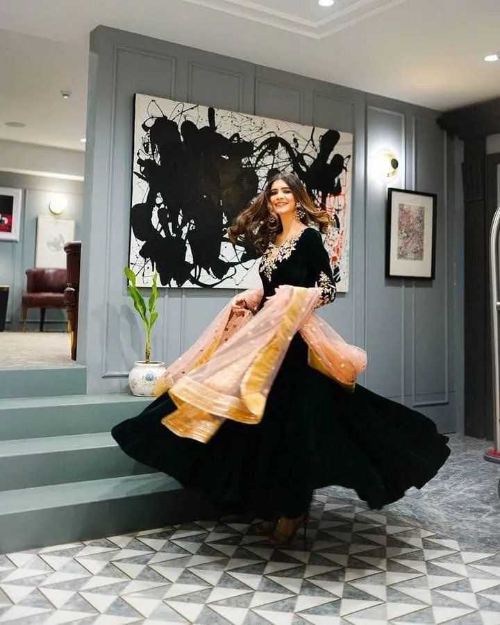Dark Green Anarkali Gown in Velvet with Embroidery Work